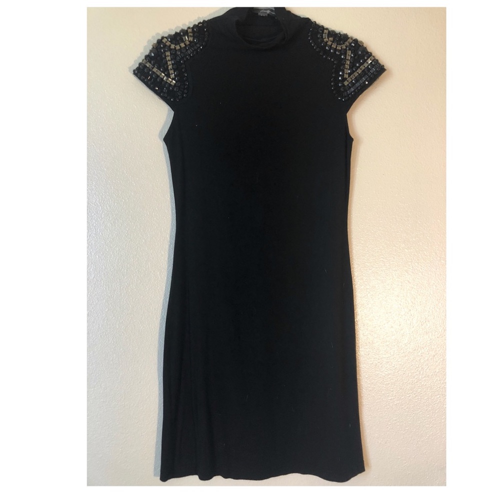 Black dress with beaded sleeves